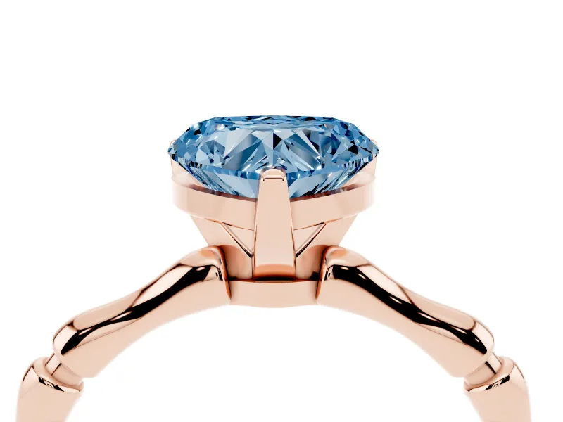 Fancy Blue Heart Cut Diamond Solitaire Ring Set in Rose gold with Bamboo Band and Prong Setting