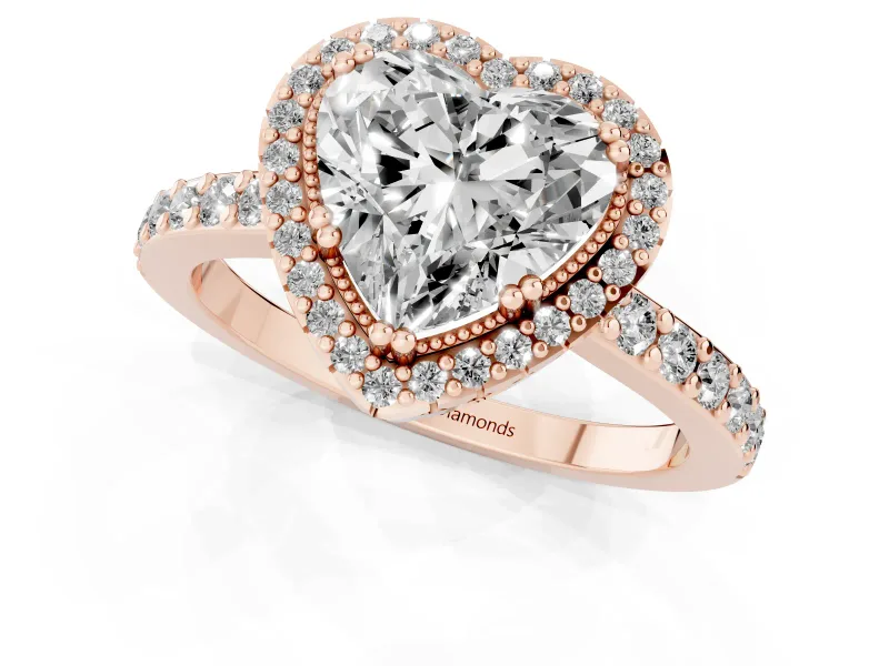 Heart Cut Diamond Halo Engagement Ring Set in Rose gold with Milgrain Detail and Pavé Band