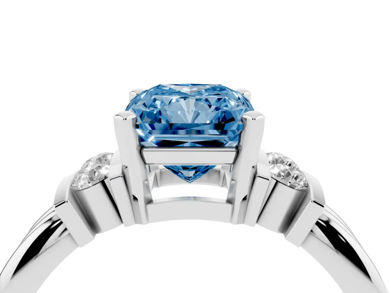 Fancy Blue Three-Stone Radiant Cut Diamond Channel Set Ring Set in Silver with Bar Prongs