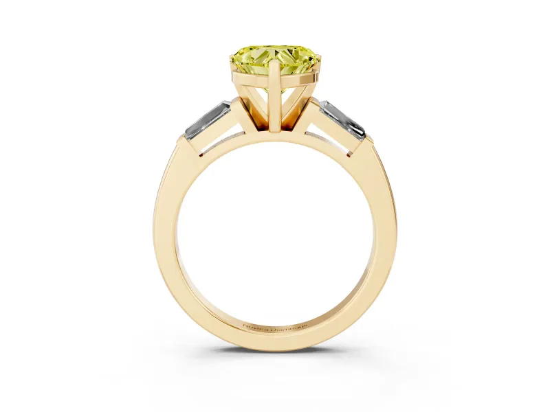 Fancy Yellow Heart Cut Diamond Solitaire Ring Set in Yellow gold with Tapered Baguette Side Stones and Prong Setting