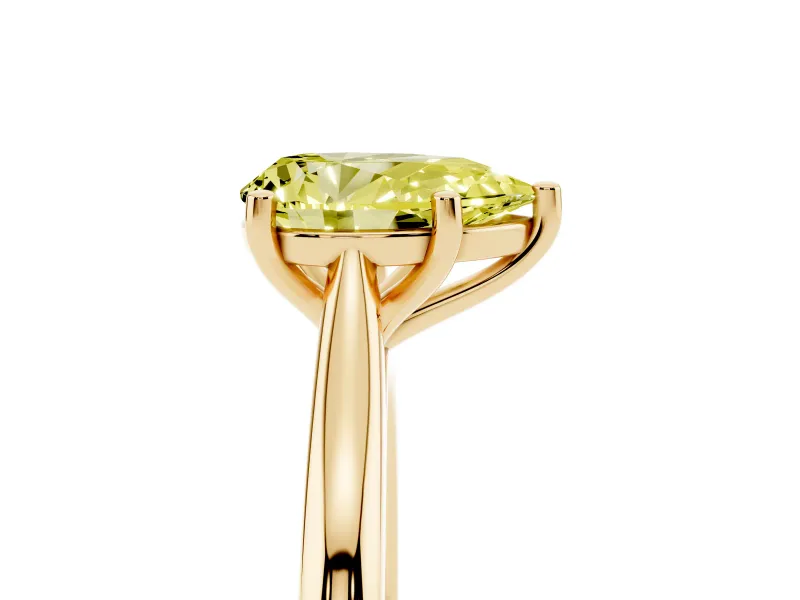 Fancy Yellow Pear Cut Diamond Solitaire Ring Set in Yellow gold with Cathedral Band and Prong Setting