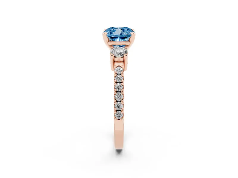 Cushion Cut Three Stone Pavé Engagement Ring Setting for a Fancy Blue Lab-Grown Diamond | Round Side Stones | Rose Gold