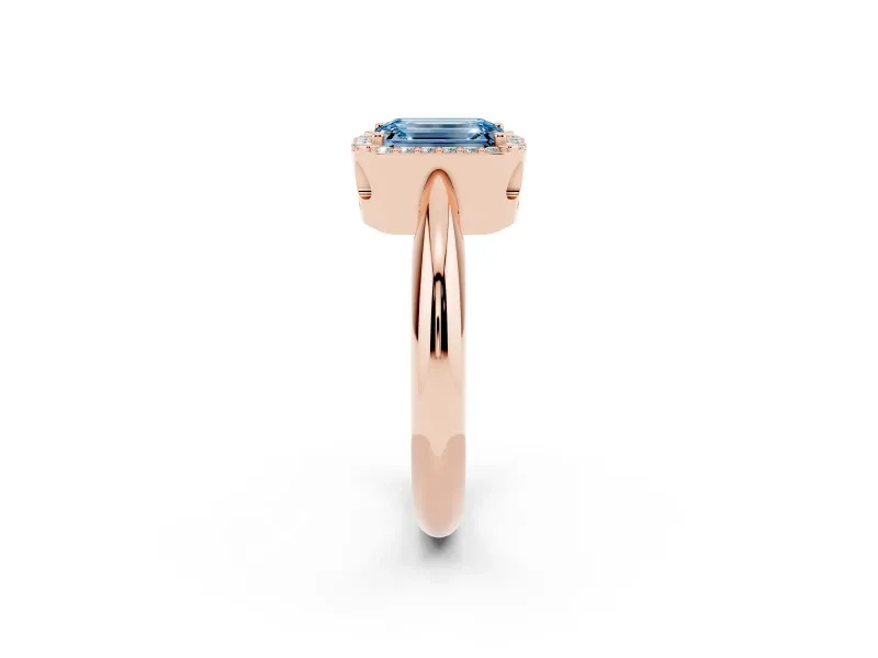 Fancy Blue Emerald Cut Diamond Halo Engagement Ring Set in Rose gold with Plain Split Shank and Prong Setting