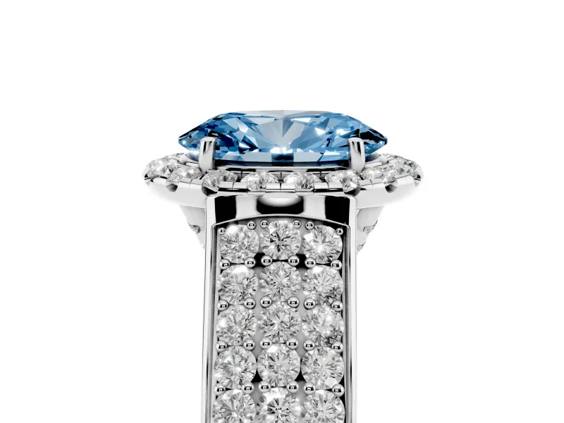 Fancy Blue Oval Cut Diamond Halo Ring Set in White gold with Pavé Band and Raised Center Setting