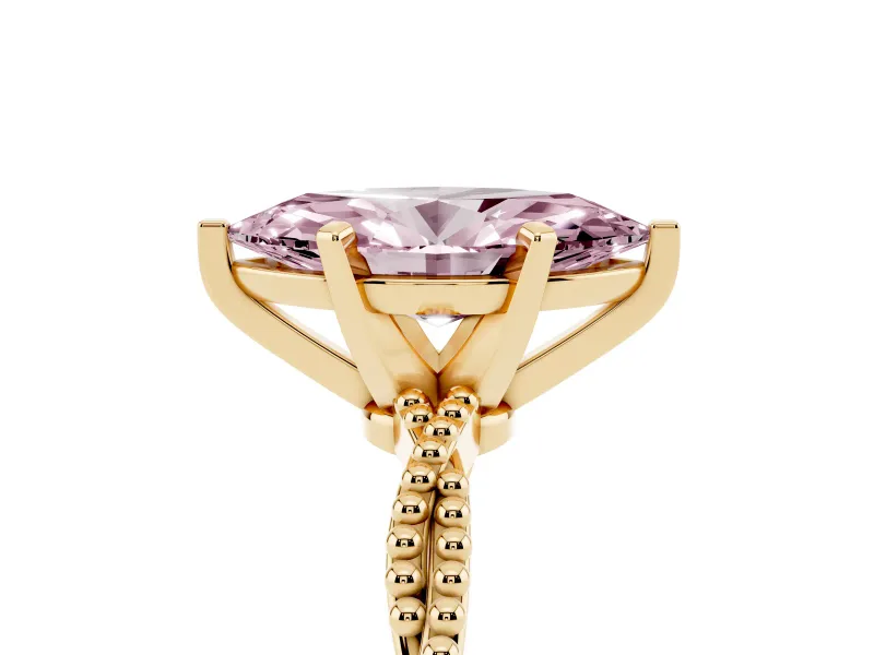 Fancy Pink Marquise Cut Diamond Solitaire Ring Set in Yellow gold with Twisted Band and Bead Prong Setting