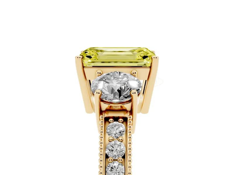 Fancy Yellow Emerald Cut Diamond Three-Stone Ring Set in Yellow gold with Round Side Stones and Pavé Band
