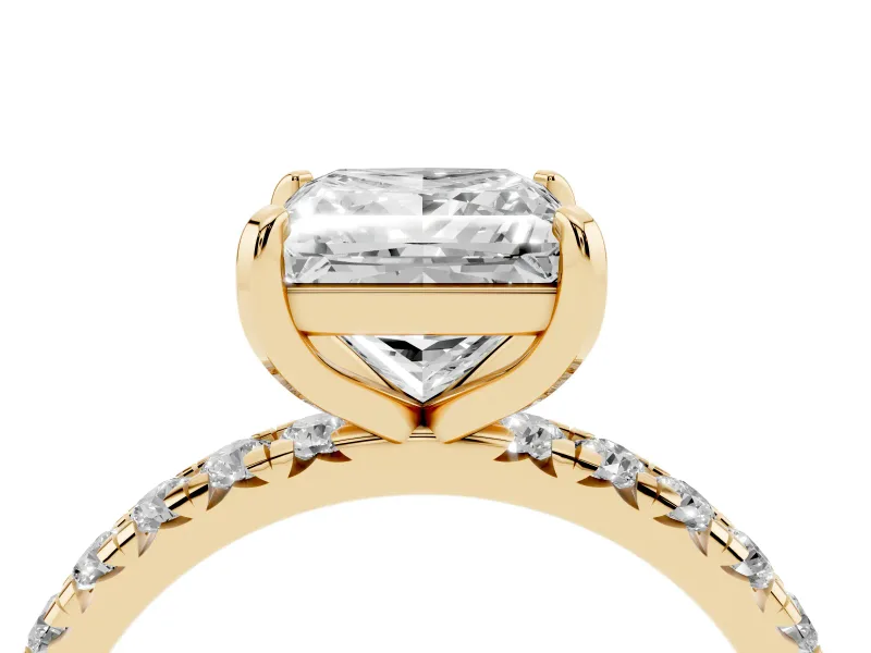 Princess Cut Diamond Pavé Solitaire Ring Set in Yellow gold with Round Band and Prong Setting