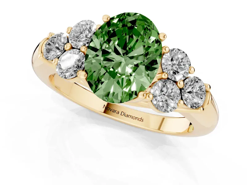 Fancy Green Oval Cut Diamond Cluster Ring Set in Yellow gold with Round Accent Stones and Prong Setting on a Plain Band