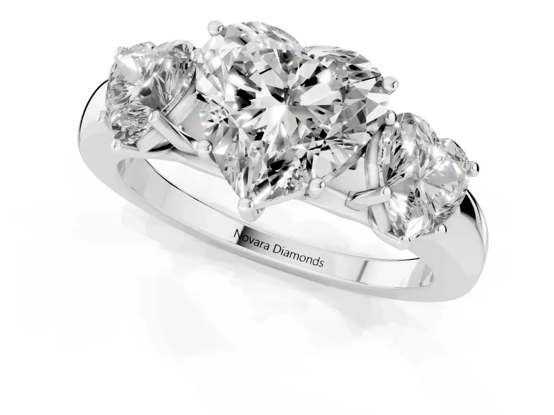 Heart Cut Diamond Three-Stone Ring Set in Silver with Bold Center and Classic Band