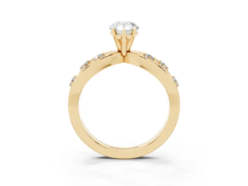 Pear Cut Diamond Solitaire Ring Set in Yellow gold with Side Stones on Criss-Cross Band and Prong Setting