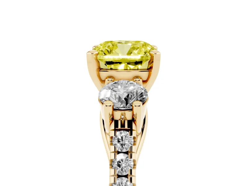 Fancy Yellow Three-Stone Cushion Cut Diamond Pavé Band Ring Set in Yellow gold with Prong-Set Trio