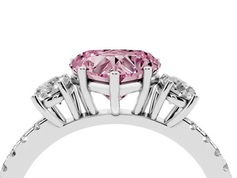 Fancy Pink Heart Cut Diamond Three-Stone Ring Set in White gold with Pavé Band and Graduated Sides