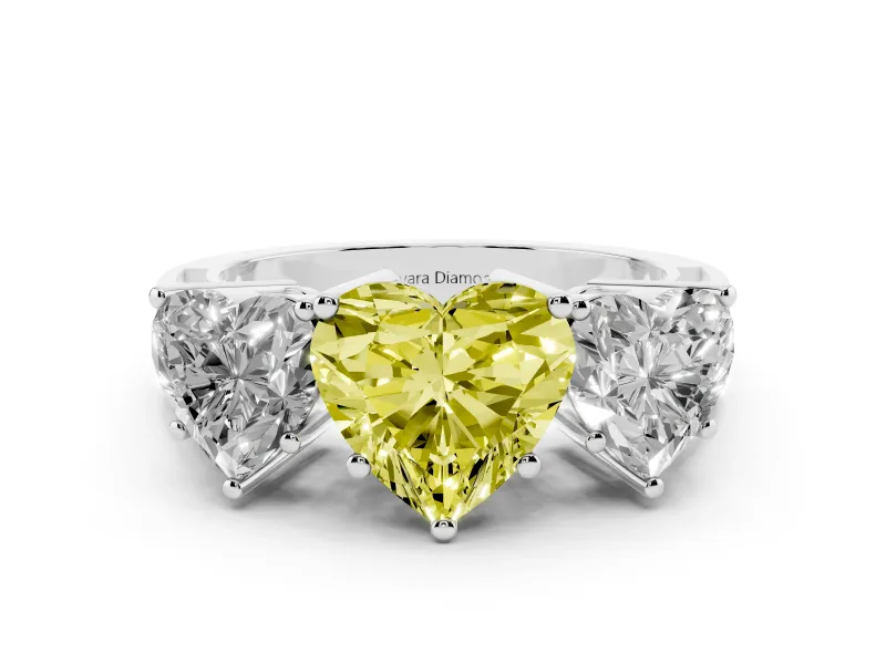 Fancy Yellow Heart Cut Diamond Three-Stone Ring Set in White gold with Textured Band