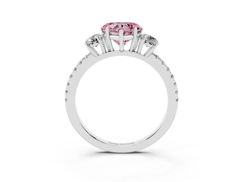 Fancy Pink Heart Cut Diamond Three-Stone Ring Set in Platinum with Pavé Band and Graduated Sides
