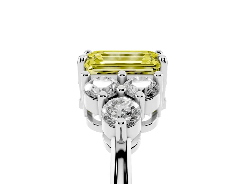 Fancy Yellow Emerald Cut Diamond Solitaire Ring Set in White gold with Cluster Accents on Each Side