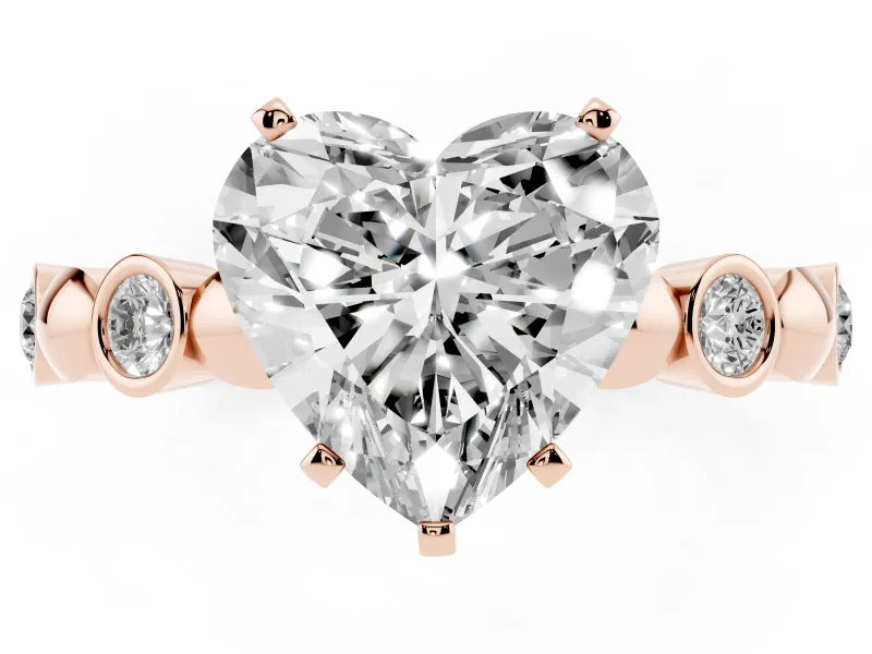 Heart Cut Diamond Solitaire Ring Set in Rose gold with Bezel-Set Accents on Beaded Band and Prong Setting