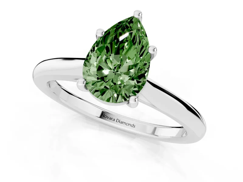 Fancy Green Pear Cut Diamond Solitaire Ring Set in White gold with Cathedral Band and Prong Setting