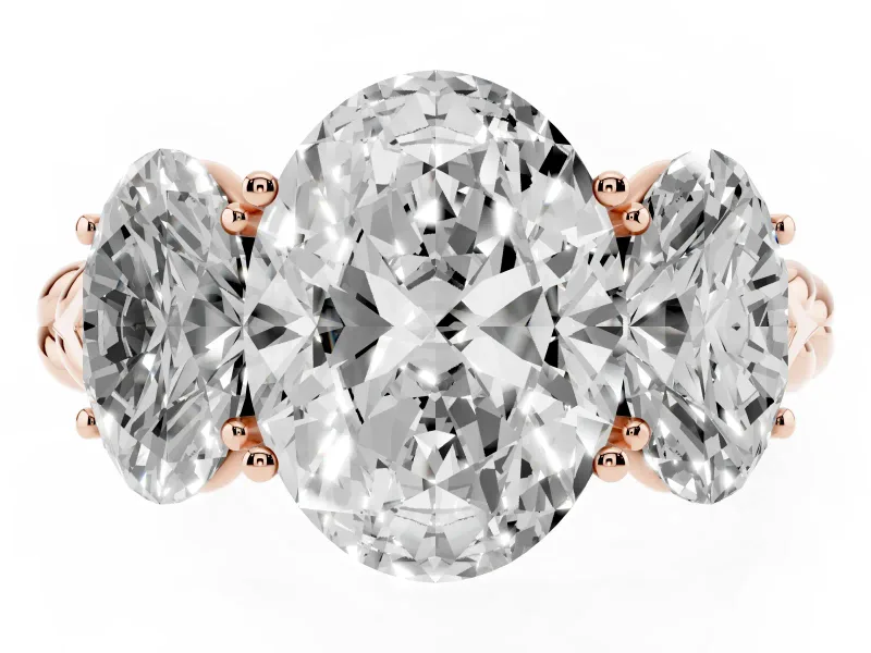 Oval Cut Diamond Three-Stone Ring Set in Rose gold with Braided Band