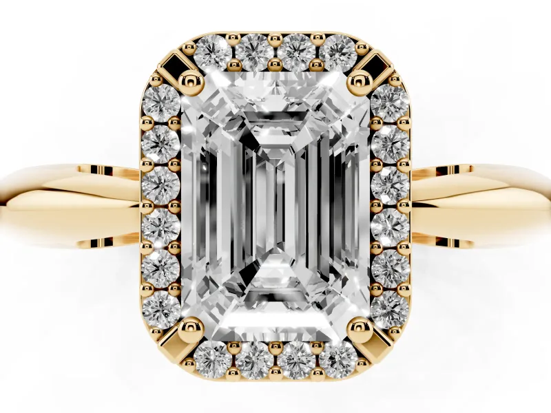 Emerald Cut Diamond Halo Engagement Ring Set in Yellow gold with Plain Split Shank and Prong Setting