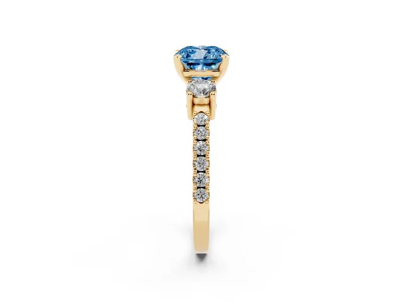 Fancy Blue Three-Stone Cushion Cut Diamond Pavé Band Ring Set in Yellow gold with Prong Setting