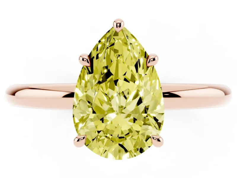 Fancy Yellow Pear Cut Diamond Solitaire Ring Set in Rose gold with Thin Band and Prong Setting