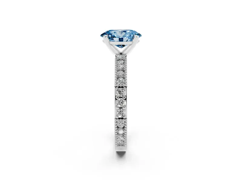 Fancy Blue Oval Cut Diamond Solitaire Ring Set in Platinum with Slim Pavé Band and Prong Setting