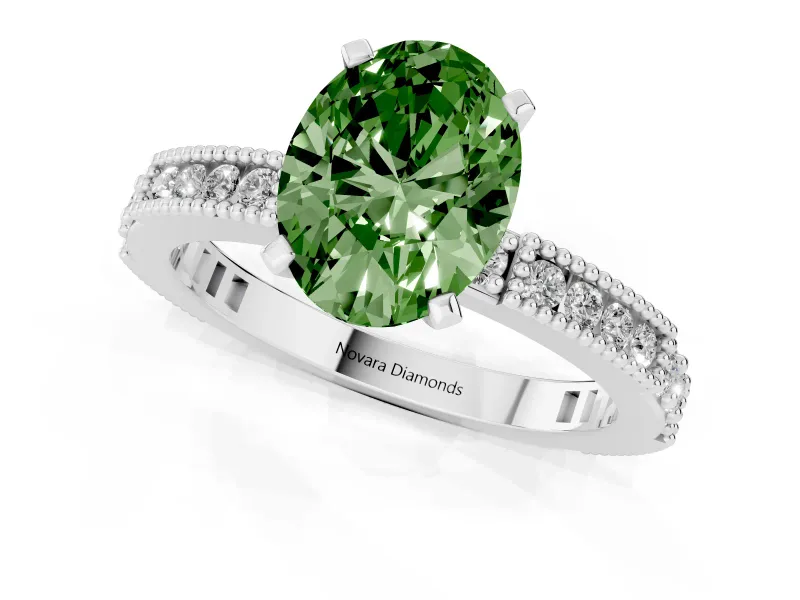 Fancy Green Oval Cut Diamond Solitaire Ring Set in Silver with Slim Pavé Band and Prong Setting