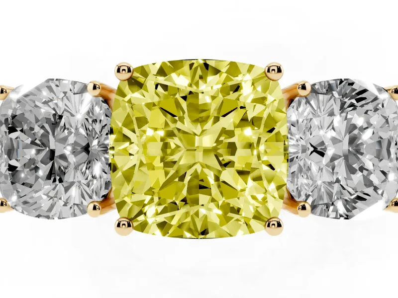 Fancy Yellow Cushion Cut Diamond Three-Stone Ring Set in Yellow gold with Textured Band