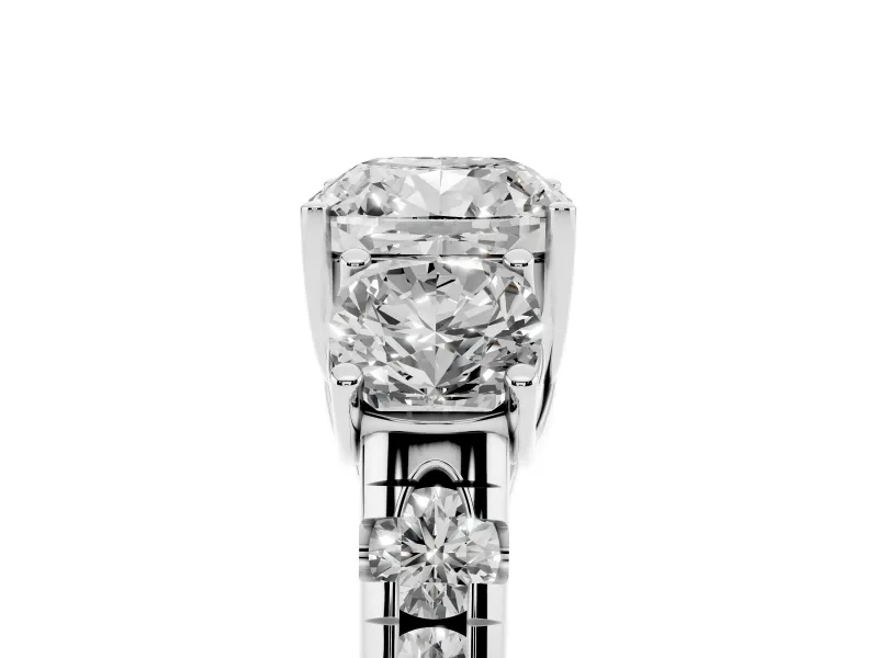 Cushion Cut Diamond Three-Stone Ring Set in White gold with Pavé Band