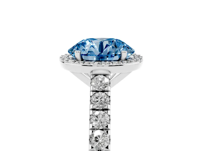 Fancy Blue Round Cut Diamond Halo Engagement Ring Set in Platinum with Pavé Band and Prong Setting