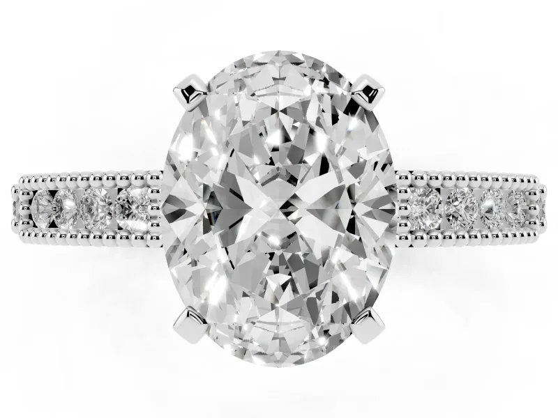Oval Cut Diamond Solitaire Ring Set in Platinum with Slim Pavé Band and Prong Setting
