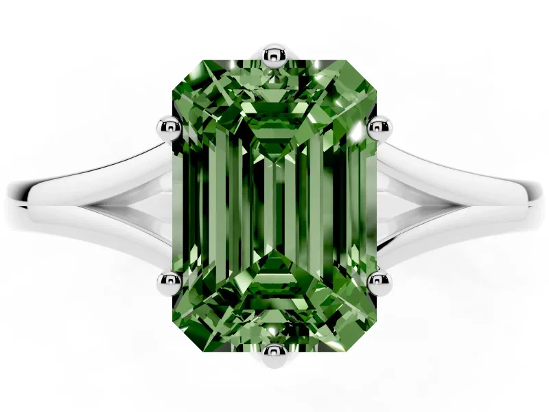 Fancy Green Emerald Cut Diamond Solitaire Ring Set in White gold with Polished Tapered Band and Prong Setting