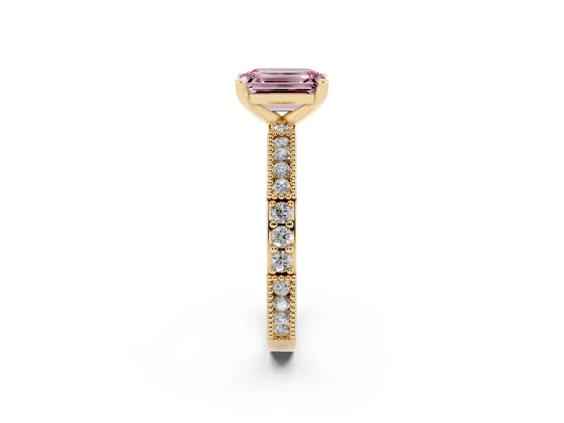 Fancy Pink Emerald Cut Diamond Solitaire Ring Set in Yellow gold with Slim Pavé Band and Prong Setting