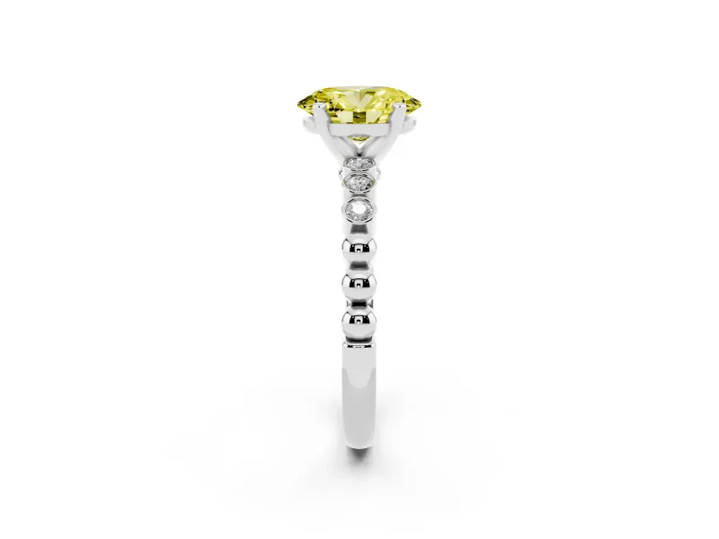 Fancy Yellow Oval Cut Diamond Solitaire Engagement Ring Set in Platinum with Bezel Accents on Beaded Band