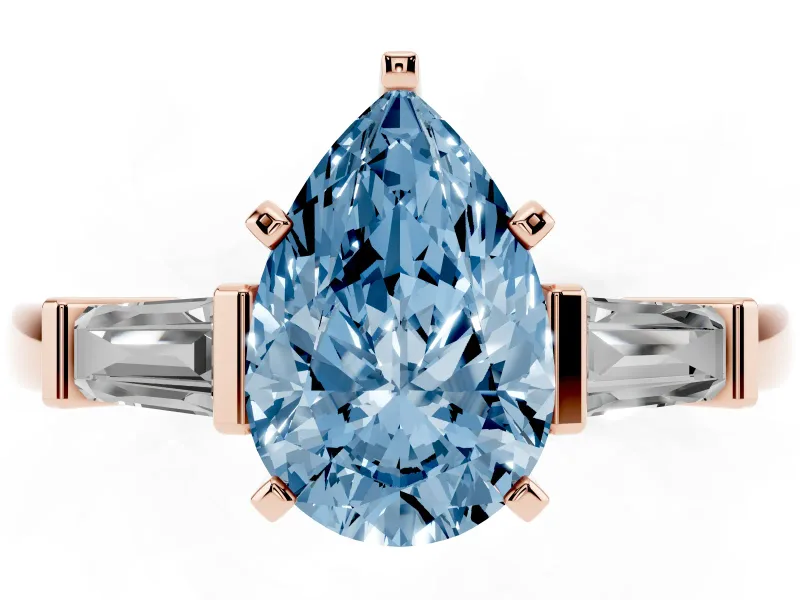 Fancy Blue Pear Cut Diamond Solitaire Ring Set in Rose gold with Tapered Baguette Accents and Prong Setting