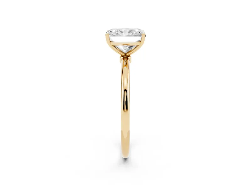 Radiant Cut Diamond Solitaire Engagement Ring Set in Yellow gold with Thin Band and Prong Setting