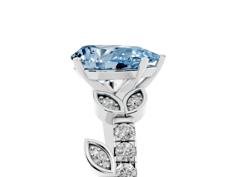 Fancy Blue Pear Cut Diamond Solitaire Leaf-Inspired Ring Set in Platinum with Pavé Band and Prong Setting