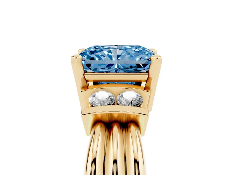 Fancy Blue Three-Stone Radiant Cut Diamond Channel Set Ring Set in Yellow gold with Bar Prongs