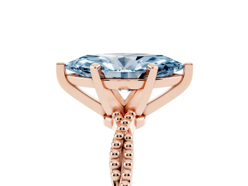 Fancy Blue Marquise Cut Diamond Solitaire Ring Set in Rose gold with Twisted Band and Bead Prong Setting