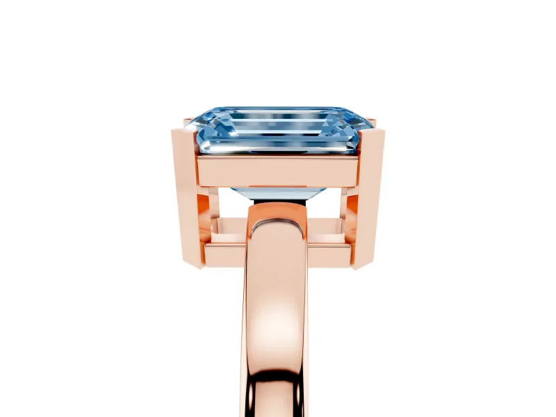 Fancy Blue Emerald Cut Diamond Solitaire Ring Set in Rose gold with Prong Head and Smooth Polished Band