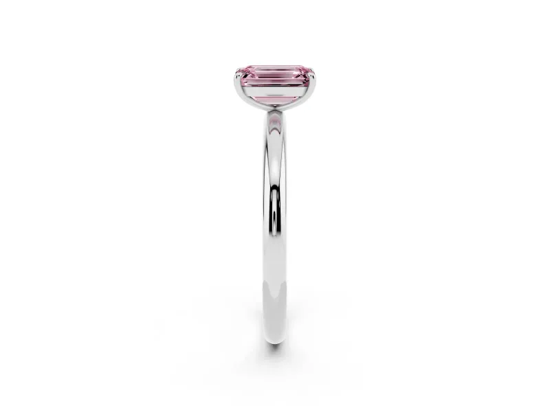 Fancy Pink Emerald Cut Diamond Solitaire Ring Set in Silver with Prong Setting on a Polished Plain Band