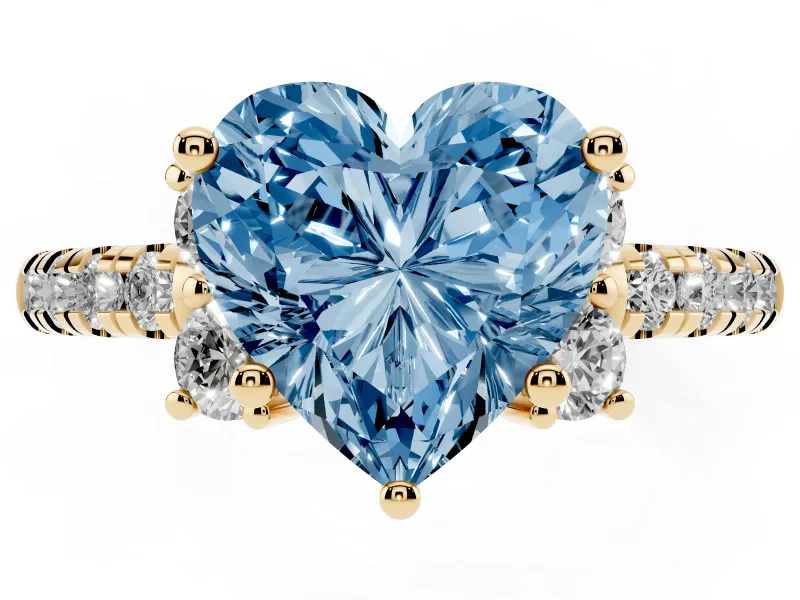 Heart-Shaped Side Stone Engagement Ring Setting for a Fancy Blue Lab-Grown Diamond | Pave Band | Yellow Gold