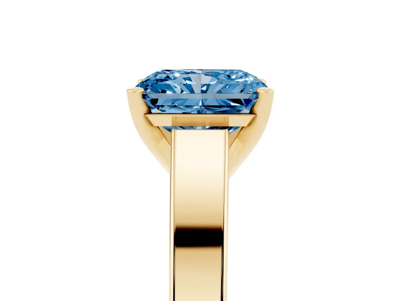 Fancy Blue Radiant Cut Diamond Solitaire Engagement Ring Set in Yellow gold with Prong Setting and Tapered Band