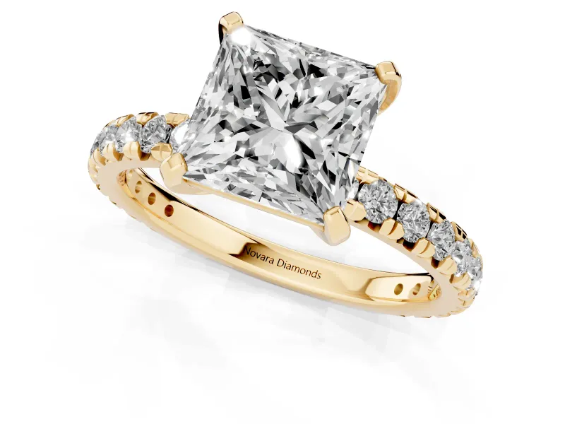 Princess Cut Diamond Pavé Solitaire Ring Set in Yellow gold with Round Band and Prong Setting