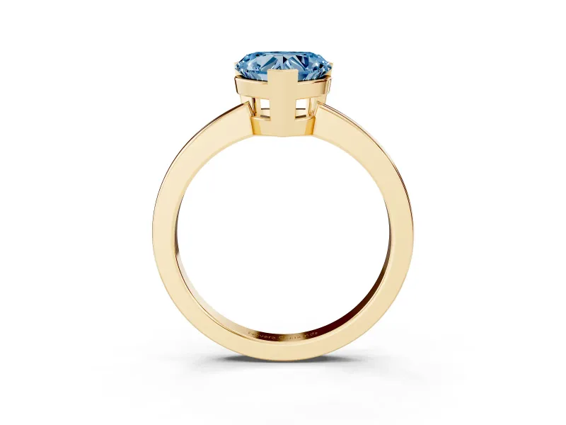 Fancy Blue Heart Cut Diamond Solitaire Ring Set in Yellow gold with Prong Head and Smooth Polished Band