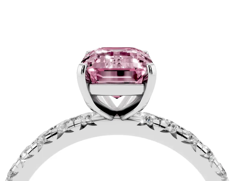 Fancy Pink Emerald Cut Diamond Pavé Solitaire Ring Set in White gold with Round Band and Prong Setting