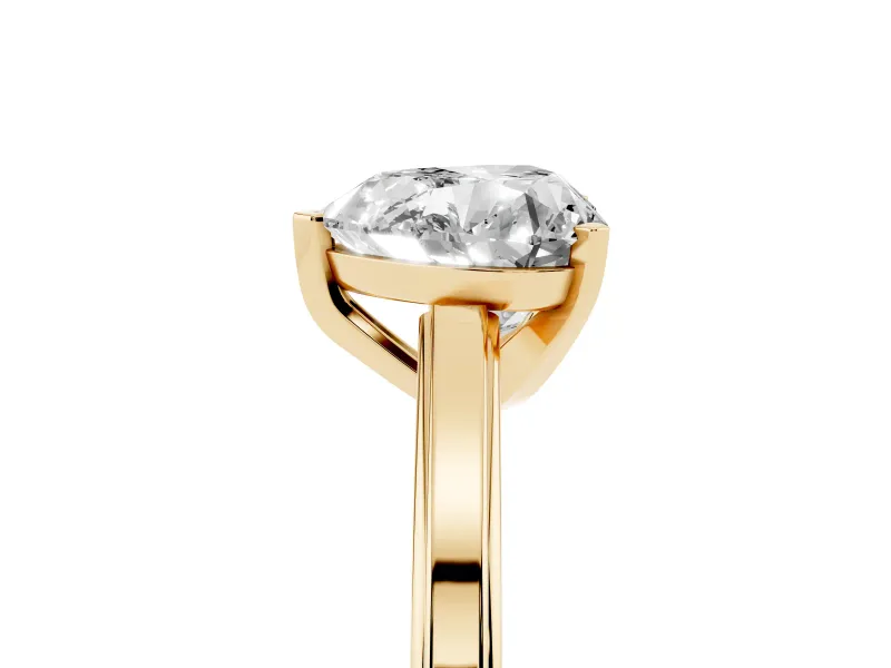 Heart Cut Diamond Solitaire Ring Set in Yellow gold with Prong Setting and Classic Band
