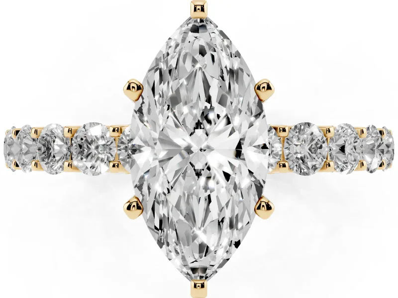 Marquise Cut Diamond Solitaire Ring Set in Yellow gold with Shared Prong Pavé Band