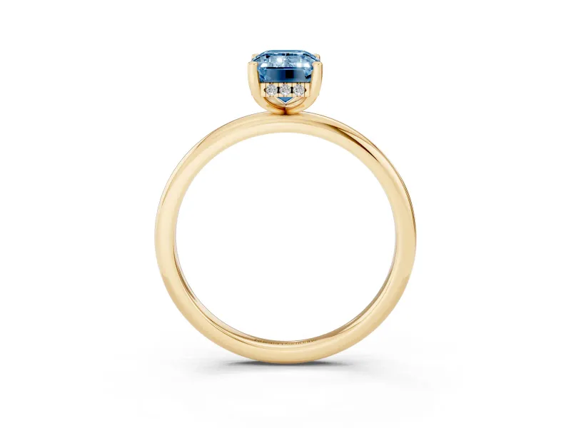 Fancy Blue Emerald Cut Diamond Solitaire Engagement Ring Set in Yellow gold with Prong Setting and Polished Band