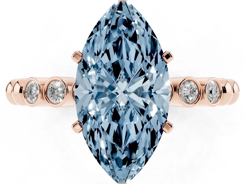 Fancy Blue Marquise Cut Diamond Solitaire Engagement Ring Set in Rose gold with Bezel Accents on Beaded Band